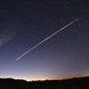 This long-exposure image shows a trail of a group of SpaceX’s Starlink satellites passing over Uruguay.